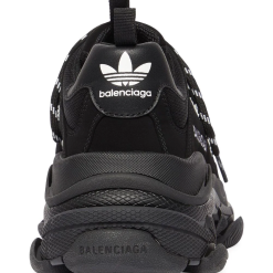 Balenciaga X Adidas Triple S Sneakers in a stylish black and white colorway, featuring a chunky sole and premium design, perfect for sneaker enthusiasts looking for high-quality replica sneakers.