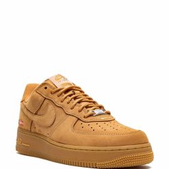 High-quality replica sneakers featuring Nike Air Force 1 Low Top design, showcasing a classic silhouette, white leather upper, and iconic Swoosh logo, perfect for stylish casual wear.