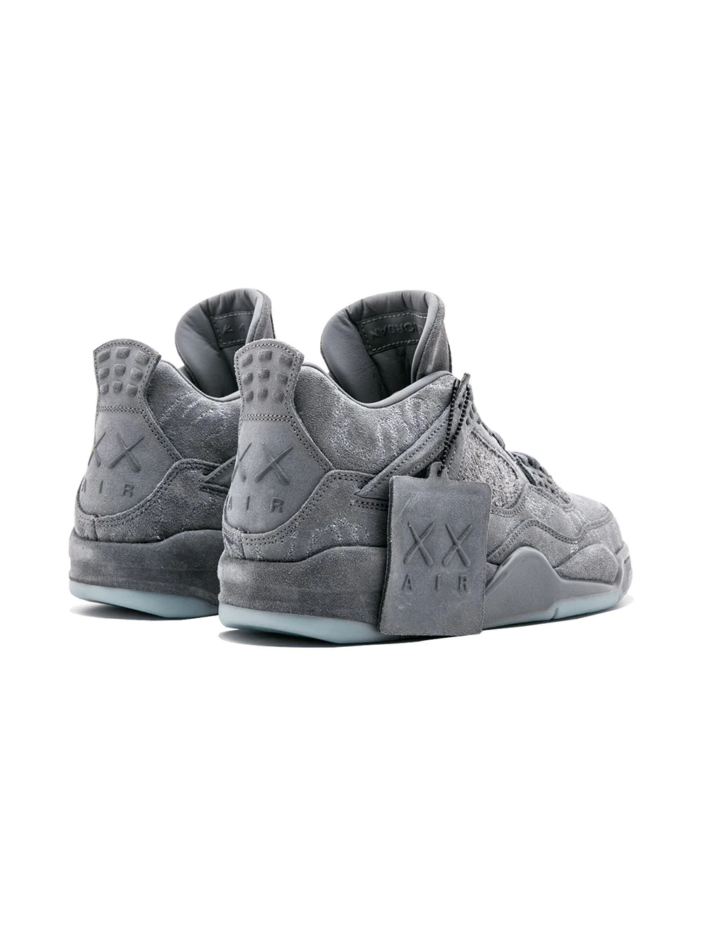 High-quality replica sneakers featuring the Nike Air Jordan 4 Retro Kaws, showcasing a sleek design with a stylish grey upper, unique fabric textures, and iconic Jordan branding, perfect for sneaker enthusiasts.