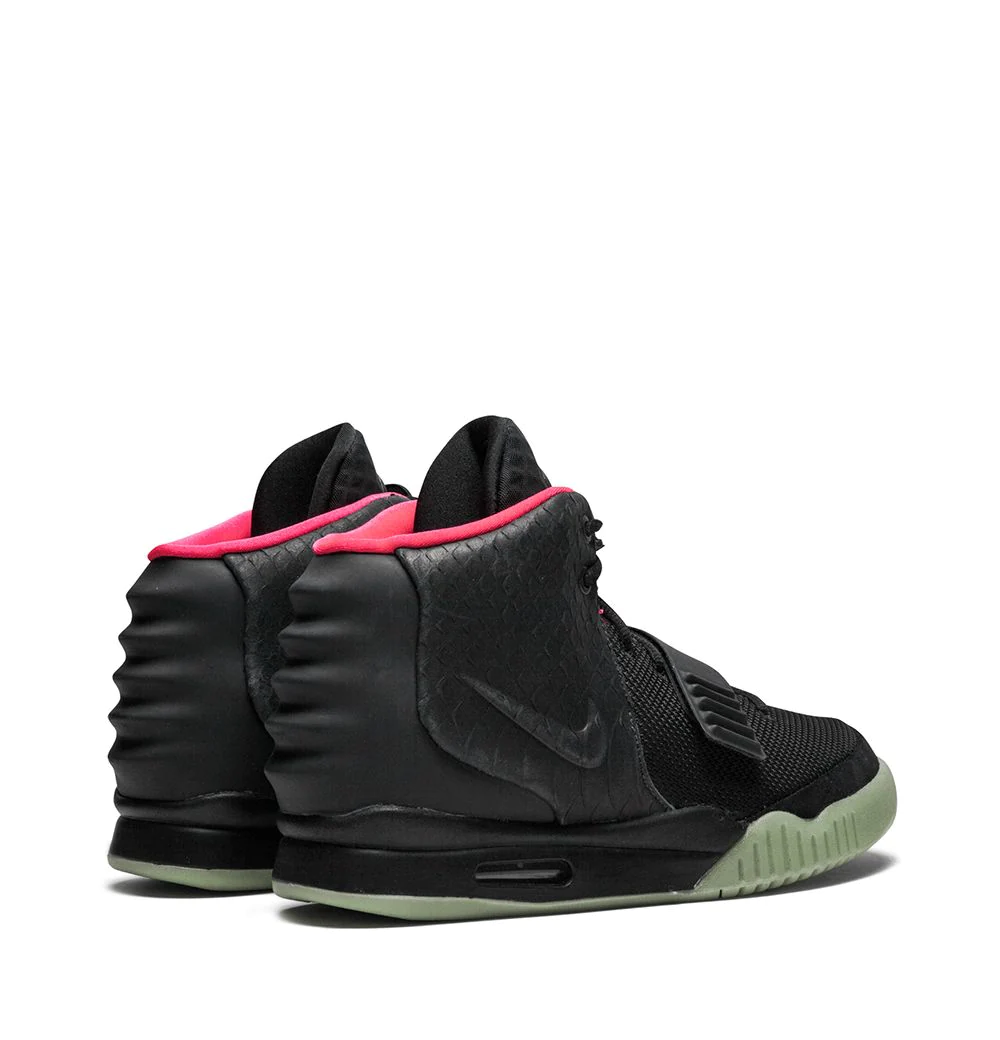 High-quality replica sneakers featuring the Nike Air Yeezy 2 NRG design with distinct black and red colorway, showcasing premium materials and signature details for sneaker enthusiasts.