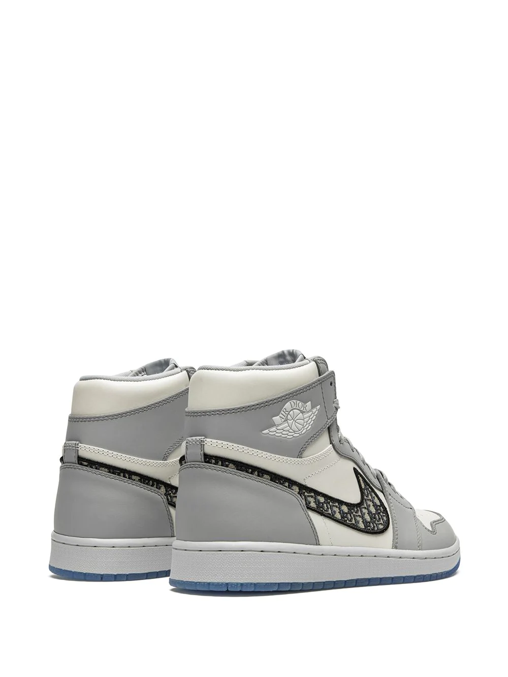 Close-up of Nike Jordan x Dior Air Jordan 1 High Sneakers, showcasing high-quality materials and intricate design details, ideal for sneaker enthusiasts seeking stylish replica sneakers.