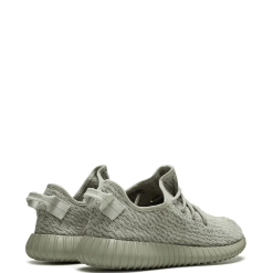 High-quality replica sneakers featuring the Adidas Yeezy Boost 350 Moonrock with a sleek, muted grey upper, distinctive textured fabric, and signature ribbed midsole, perfect for stylish streetwear.