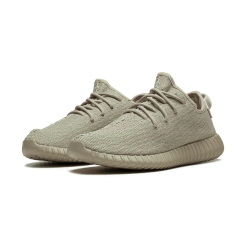 High-quality replica sneakers featuring the Adidas Yeezy Boost 350 in Oxford Tan colorway, showcasing a stylish and minimalist design with a woven upper and signature Boost sole for comfort.