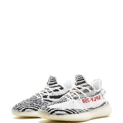 Adidas Yeezy Boost 350 V2 Zebra replica sneakers featuring a distinctive black and white striped design, showcasing the sleek silhouette and Boost cushioning technology, perfect for sneaker enthusiasts seeking high-quality shoes.