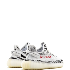 Adidas Yeezy Boost 350 V2 Zebra 2017 Release Sneakers in black and white colorway, showcasing a stylish design perfect for sneaker enthusiasts; quality replica sneakers for those seeking fashionable shoes.