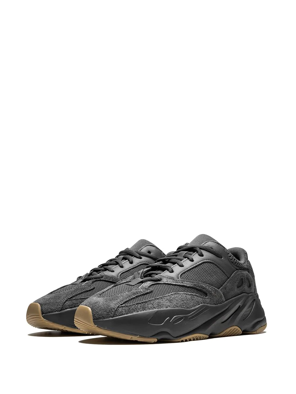Adidas Yeezy Boost 700 Utility Black replica sneakers displayed from the side, showcasing their sleek black design, textured upper, and comfortable sole, perfect for sneaker enthusiasts looking for high-quality shoes.