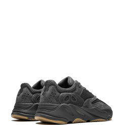Adidas Yeezy Boost 700 Utility Black replica sneakers showcased in a sleek and modern design, featuring a stylish black upper with hints of gray and a comfortable boost sole, perfect for sneaker enthusiasts looking for high-quality shoes.