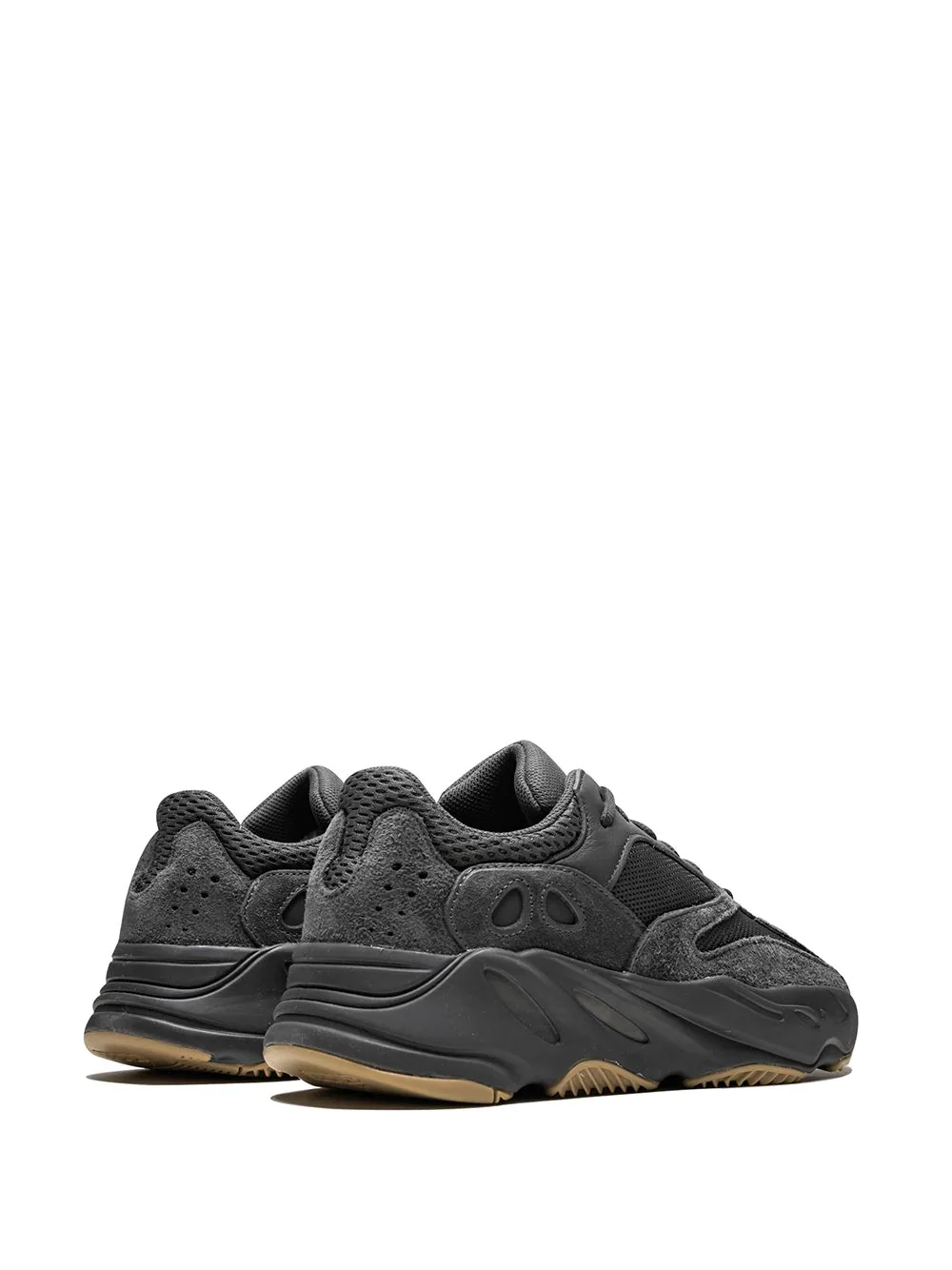 Adidas Yeezy Boost 700 Utility Black replica sneakers showcased in a sleek and modern design, featuring a stylish black upper with hints of gray and a comfortable boost sole, perfect for sneaker enthusiasts looking for high-quality shoes.