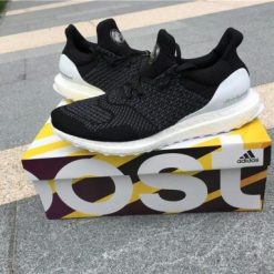 High-quality replica sneakers of the Adidas Ub Black White model, featuring a sleek black and white design with a comfortable fit suitable for casual wear and athletic activities.