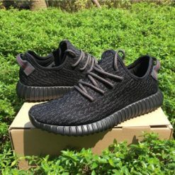 Adidas Yeezy 350 Boost Pirate Black replica sneakers showcasing a sleek black design, featuring the signature Boost sole and stylish detailing perfect for sneaker enthusiasts.