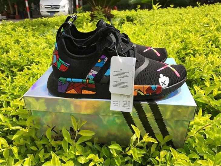Adidas NMD Black replica sneakers featuring a sleek black design, lightweight construction, and stylish silhouette perfect for casual wear and street fashion.