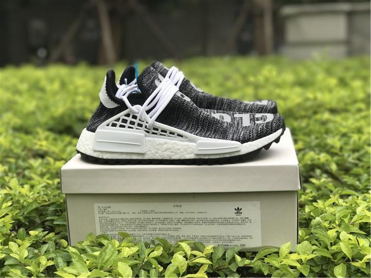 Adidas NMD Human Race Gray AC 7360 replica sneakers showcasing a sleek design with a gray upper and bold branding, ideal for stylish and contemporary footwear enthusiasts.