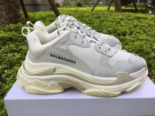 Wholesale Luxury Balenciaga Triple S Creamy White sneakers showcasing a high-quality design, featuring a blend of cream and white colors, perfect for sneaker enthusiasts seeking stylish replica sneakers.