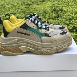 Balenciaga Triple S Yellow Green replica sneakers featuring a vibrant yellow and green colorway, designed with a chunky silhouette and premium materials for an authentic look.