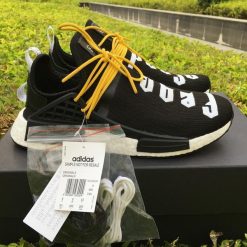 Fear Of God X Adidas Nmd Pharrell Williams Human Race Black White replica sneakers featuring a sleek black and white colorway, distinctive branding, and a comfortable silhouette ideal for streetwear fashion.
