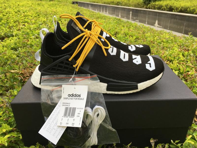 Fear Of God X Adidas Nmd Pharrell Williams Human Race Black White replica sneakers featuring a sleek black and white colorway, distinctive branding, and a comfortable silhouette ideal for streetwear fashion.