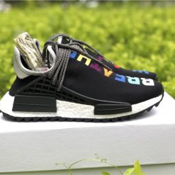 Adidas Human Race Black replica sneakers showcasing a sleek black design with bold white lettering, perfect for sneaker enthusiasts looking for high-quality alternatives.