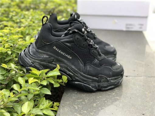 Balenciaga Triple S Trainer Black high-quality replica sneakers showcasing a sleek design, chunky silhouette, and premium materials, ideal for sneaker enthusiasts and fashion-forward individuals.