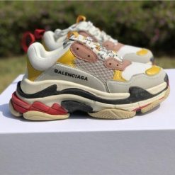 Balenciaga Triple S Yellow replica sneakers showcasing a stylish and vibrant design, perfect for streetwear enthusiasts and sneaker collectors alike.