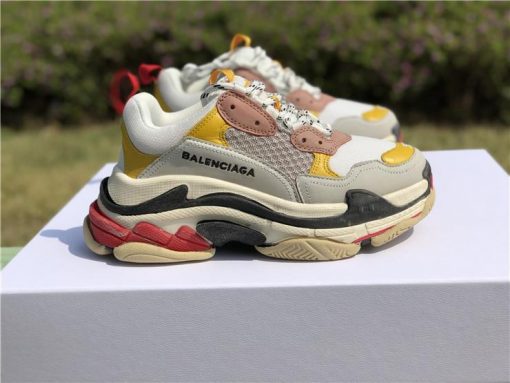 Balenciaga Triple S Yellow replica sneakers showcasing a stylish and vibrant design, perfect for streetwear enthusiasts and sneaker collectors alike.