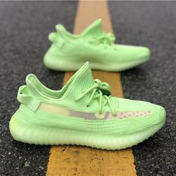 Adidas Yeezy Boost 350 V2 Glow In The Dark replica sneakers showcasing a vibrant neon green design, perfect for sneaker enthusiasts seeking high-quality alternatives.