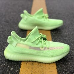Adidas Yeezy Boost 350 V2 Glow In The Dark replica sneakers featuring a vibrant glow-in-the-dark finish, sleek silhouette, and textured upper for a stylish and eye-catching look.