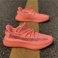 Adidas Yeezy Boost 350 V2 Pink GID replica sneakers showcasing a vibrant pink upper with reflective details, designed for style and comfort, perfect for sneaker enthusiasts and collectors.