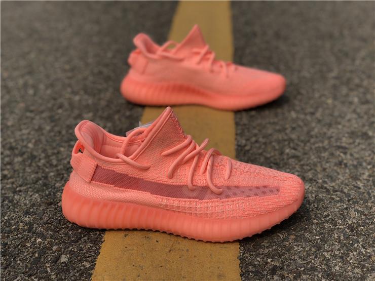 Adidas Yeezy Boost 350 V2 Pink GID replica sneakers showcasing a vibrant pink upper with reflective details, designed for style and comfort, perfect for sneaker enthusiasts and collectors.