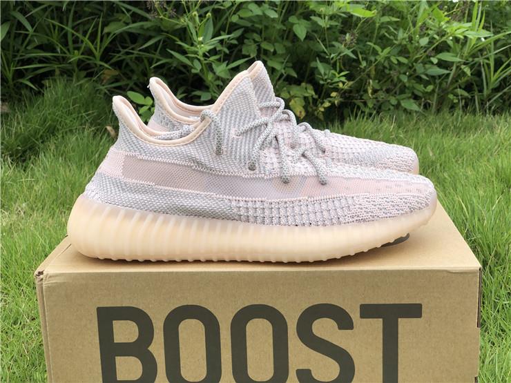 Adidas Yeezy Boost 350 V2 Synth replica sneakers featuring a lightweight mesh upper in a soft beige tone, designed with iconic side stripe detailing and a comfortable Boost sole for ultimate cushioning and style.