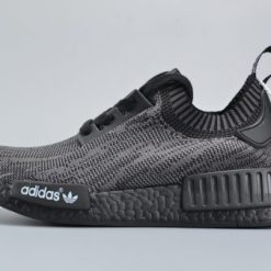 Adidas NMD R1 Friends and Family Pitch Black replica sneakers showcasing a sleek black design with signature three-stripe branding and cushioned sole, perfect for sneaker enthusiasts seeking high-quality replicas.