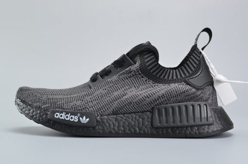 Adidas NMD R1 Friends and Family Pitch Black replica sneakers showcasing a sleek black design with signature three-stripe branding and cushioned sole, perfect for sneaker enthusiasts seeking high-quality replicas.