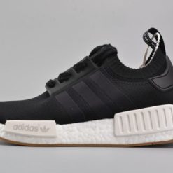 Adidas NMD R1 Gum Pack Black replica sneakers featuring a sleek black upper, gum sole, and contemporary design, perfect for casual wear and sneaker enthusiasts.