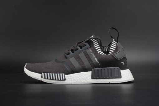 Adidas NMD R1 Japan Boost Grey replica sneakers featuring a stylish grey upper, signature Boost cushioning, and a sleek design perfect for sneaker enthusiasts.