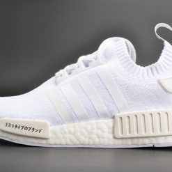Adidas NMD R1 Primeknit Japan Triple White BZ0221 replica sneakers on display, featuring a sleek white design with prime knit upper and iconic NMD cushioning for a stylish and comfortable look.
