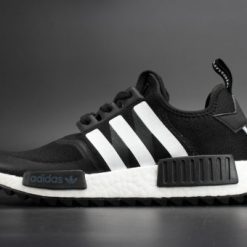 Adidas NMD R1 Trail White Mountaineering Core Black replica sneakers showcasing a sleek black design with white accents, ideal for sneaker enthusiasts seeking high-quality footwear alternatives.