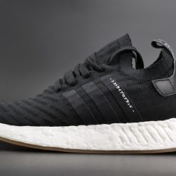 Adidas NMD R2 Primeknit Japan Black high-quality replica sneakers showcasing a sleek black design with comfortable Primeknit upper, perfect for style and performance.