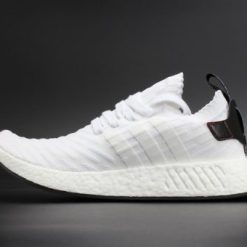 Adidas NMD R2 Primeknit in White and Black, showcasing a stylish design perfect for casual wear, available as high-quality replica sneakers.
