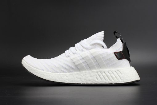 Adidas NMD R2 Primeknit in White and Black, showcasing a stylish design perfect for casual wear, available as high-quality replica sneakers.