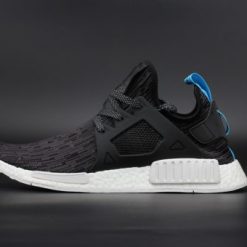 Adidas NMD XR1 PK Primeknit Glitch Black replica sneakers featuring a sleek black design with glitch pattern detailing, perfect for stylish streetwear enthusiasts.