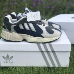 Adidas Originals Yung 1 Dark Blue Gray replica sneakers featuring a stylish blend of dark blue and gray tones, designed for comfort and a trendy look, ideal for sneaker enthusiasts and collectors.