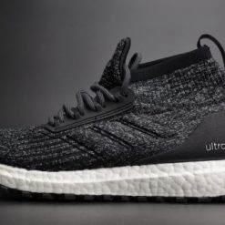 Adidas Ultra Boost ATR Mid Oreo replica sneakers showcasing a stylish black and white colorway, designed for comfort and performance with a modern athletic aesthetic.