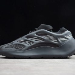 High-quality replica sneakers featuring the Adidas Yeezy 700 V3 Alvah model, showcasing a sleek black design with unique mesh and rubber overlays, perfect for stylish footwear enthusiasts.