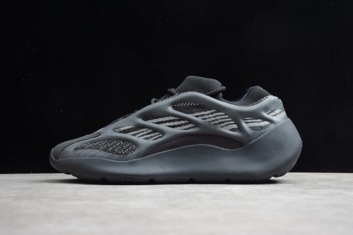 High-quality replica sneakers featuring the Adidas Yeezy 700 V3 Alvah model, showcasing a sleek black design with unique mesh and rubber overlays, perfect for stylish footwear enthusiasts.