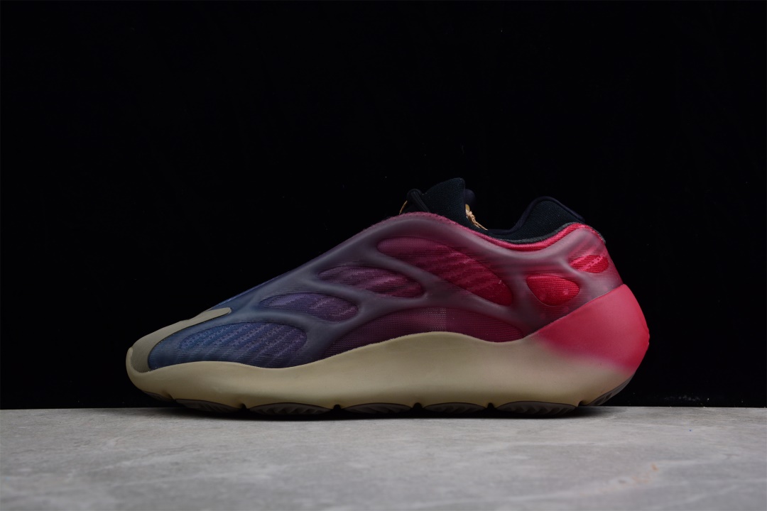 Adidas Yeezy 700 V3 Fade Carbon replica sneakers showcasing a sleek silhouette with a blend of dark hues and reflective detailing, perfect for style-conscious sneaker enthusiasts.