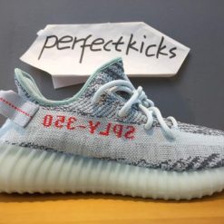 Adidas Yeezy Boost 350 V2 Blue Tint replica sneakers showcasing their distinctive light blue and gray colorway, featuring the iconic stripe and textured knit upper design, perfect for stylish comfort.