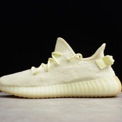 Adidas Yeezy Boost 350 V2 Butter replica sneakers showcasing a sleek design with a soft yellow colorway, featuring the iconic striped side accent and comfortable boost sole for a stylish and fashionable look.