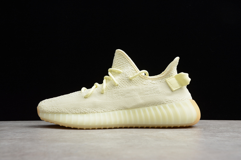 Adidas Yeezy Boost 350 V2 Butter F36980 replica sneakers showcasing a stylish design with a soft yellow hue, featuring the signature Primeknit upper, translucent Boost midsole, and durable rubber outsole for comfort and performance.