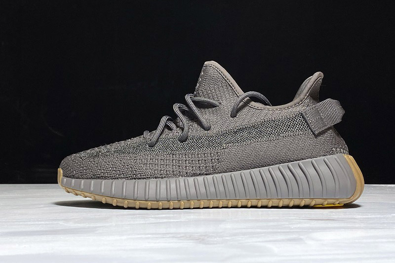Adidas Yeezy Boost 350 V2 Cinder Reflective replica sneakers featuring a sleek black and grey knit upper, reflective detailing, and a signature boost sole for enhanced comfort and style.