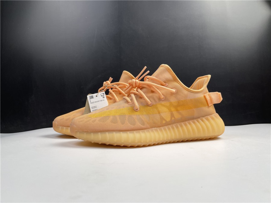 Adidas Yeezy Boost 350 V2 Moncla replica sneakers featuring a sleek design and high-quality materials, perfect for sneaker enthusiasts and collectors.
