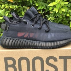 Adidas Yeezy Boost 350 V2 Mono Cinder high-quality replica sneakers showcasing a sleek design with a black and grey colorway, featuring the signature knit upper and translucent side stripe, perfect for sneaker enthusiasts looking for stylish footwear.